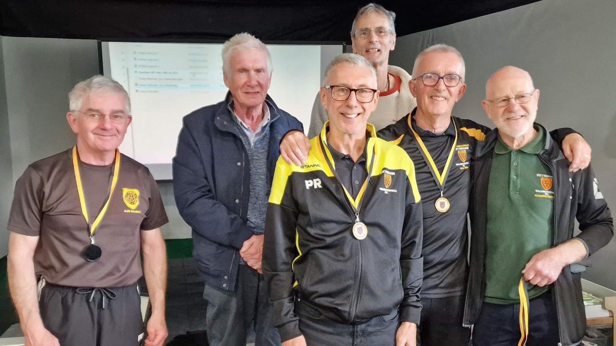 Keynsham Town WFC’s founding members receiving their commemorative medals to mark the Club’s ten-year anniversary (Back row L to